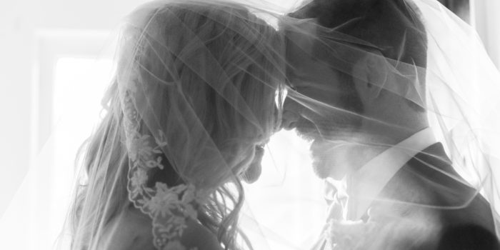 Bride and Groom backlit with veil, Rosewell Georgia wedding